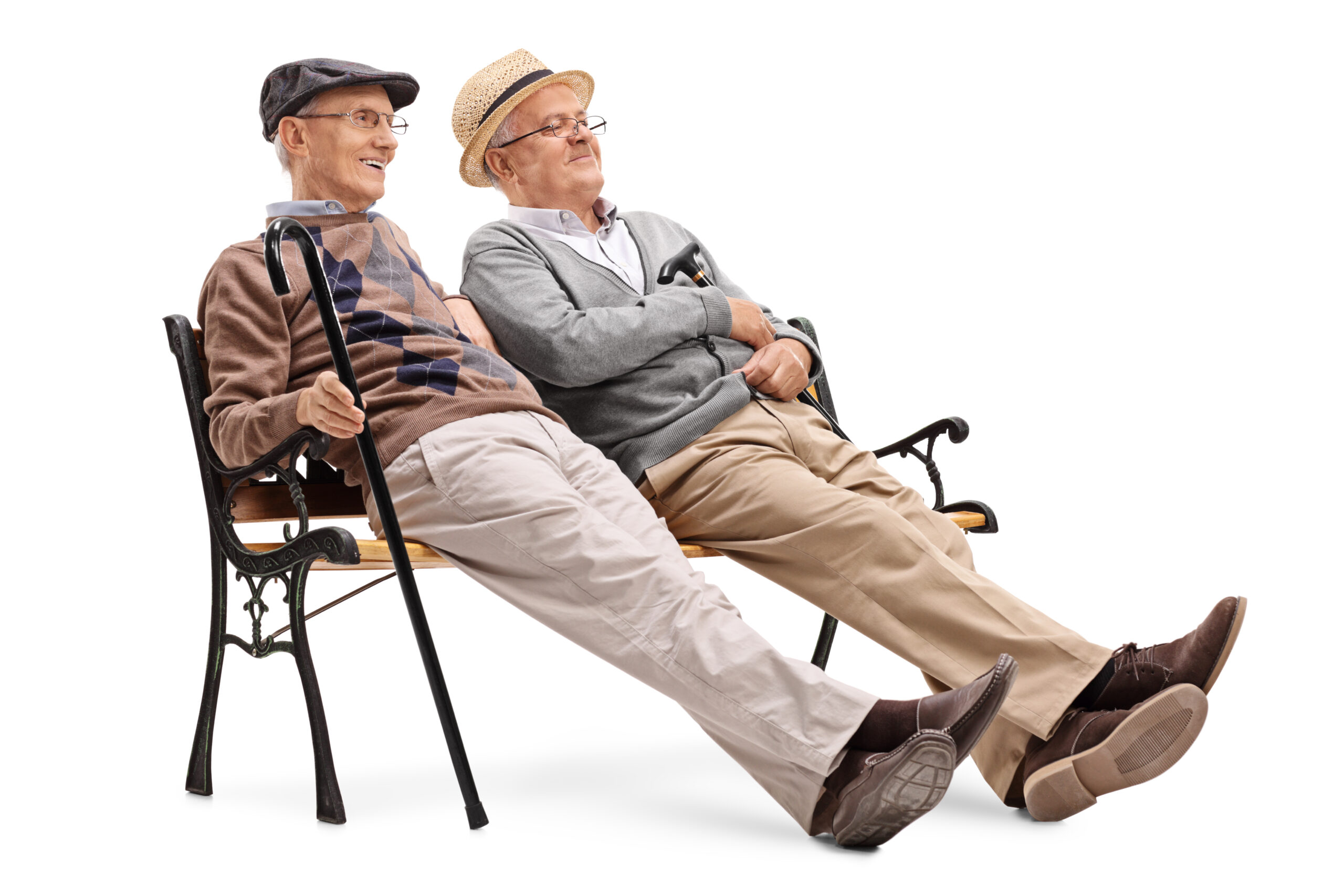 Two older gentlemen relaxing on an outside bench